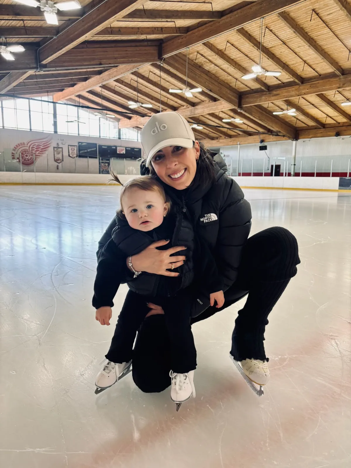 Crystalrose and her daughter Maizie together on the ice in their skates